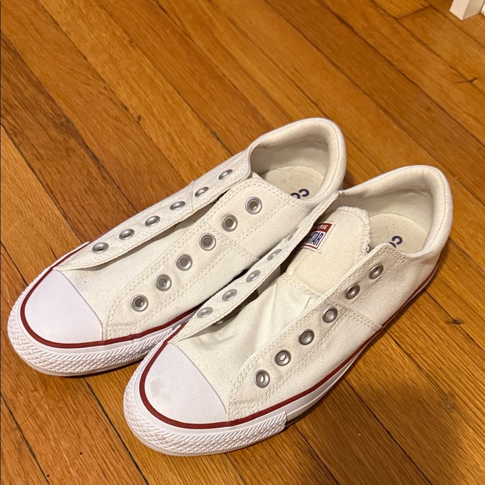 Converse women’s White Slip-On Sneakers